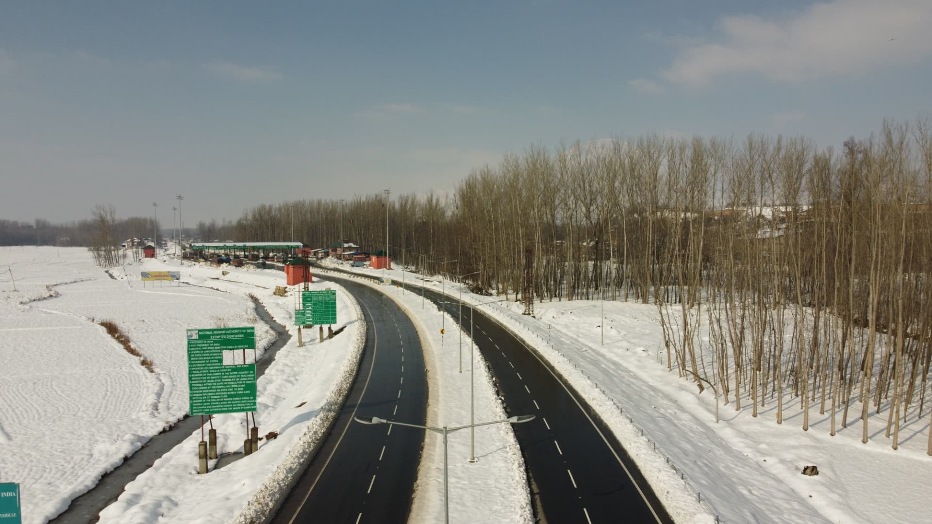Srinagar–Banihal Expressway, NH-1A, Jammu & Kashmir — snow-lined expressway with toll plaza